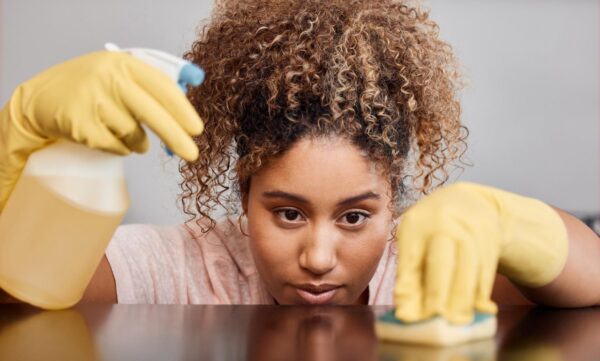 cleaning-counter-takes-lot-focus-shot-young-woman-cleaning-countertop-home_1280x855